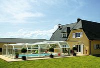 Die Paradiso-Überdachung ist harmonisch auf die Architektur des Wohnhauses abgestimmt Die Paradiso-Überdachung ist harmonisch auf die Architektur des Wohnhauses abgestimmt