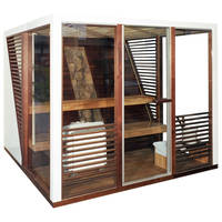 Die Impression Sauna besticht durch große Glasflächen und einen attraktiven Materialmix