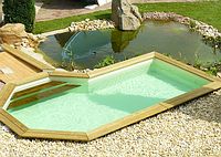 Yellow Pine erlaubt nahezu jede Schwimmbadform - hier mit angedocktem Teich